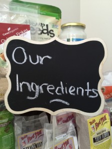 a sign that reads "our ingredients" with healthy food behind it